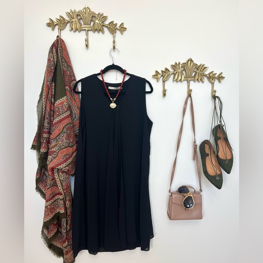 Elegant modern dress with open front tulip opening L ptp 21” l 40”